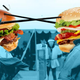 Illustration for article titled The Fast-Food Bacon Wars: McDonald's Goes High, Burger King Goes Low